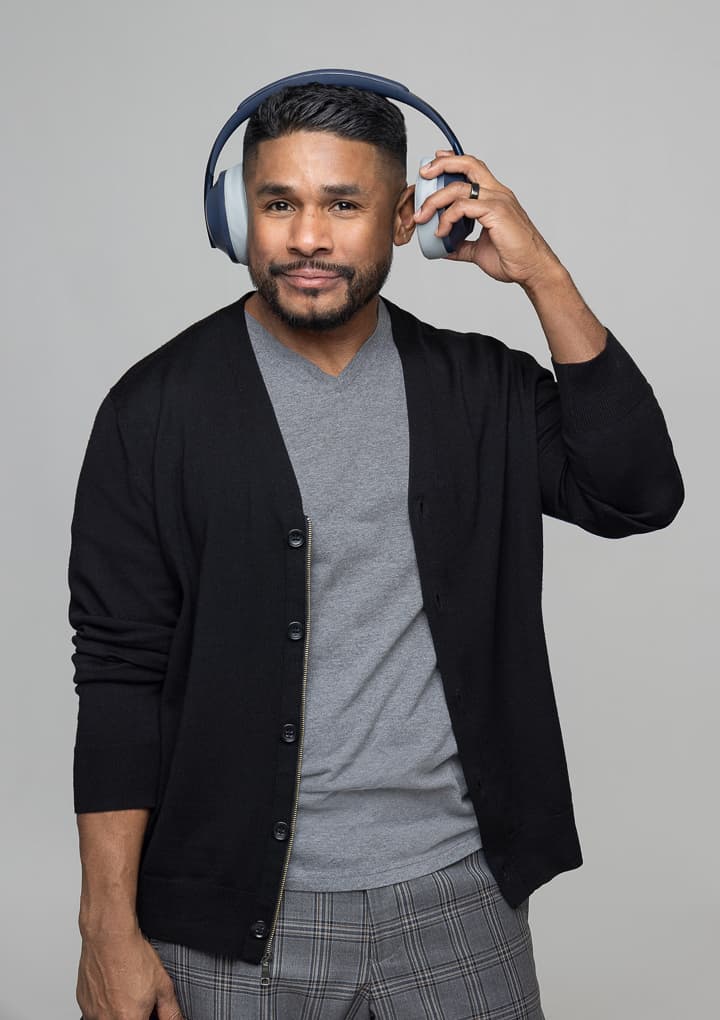 Barjes wearing headphones